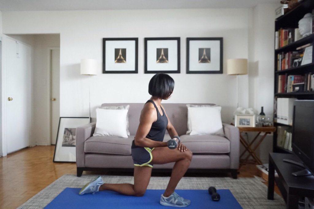woman working out on living room woman working out on living room