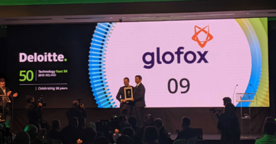 Anthony-collecting-award-at-Deloitte-Fast-50