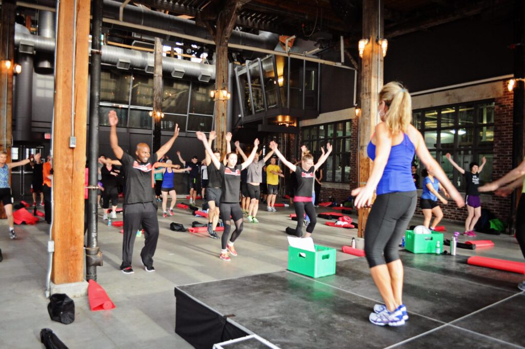 fitness manager training a class fitness manager training a class